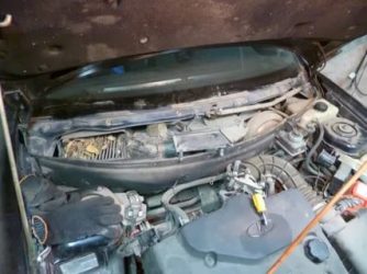 Где находится моторчик печки на приоре?