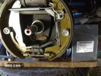 Как собрать задние тормозные колодки дэу нексия?